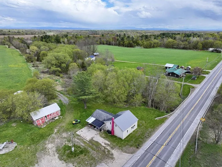 Four-Home Farm with Dairy Barn and Maple Sugar Shack on 168 Acres in West Chazy