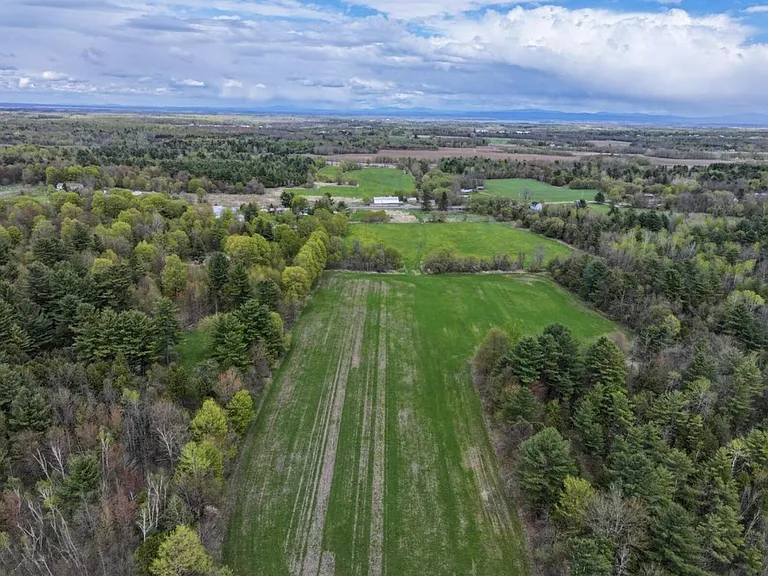Four-Home Farm with Dairy Barn and Maple Sugar Shack on 168 Acres in West Chazy