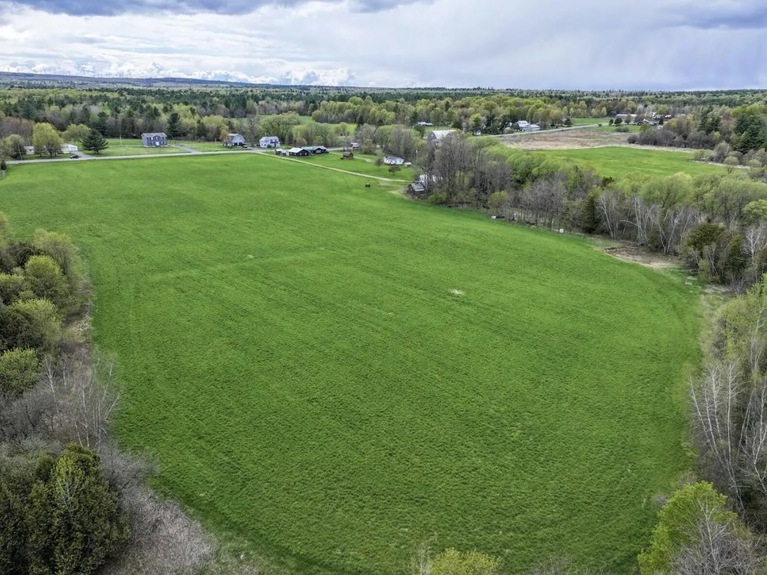 Four-Home Farm with Dairy Barn and Maple Sugar Shack on 168 Acres in West Chazy