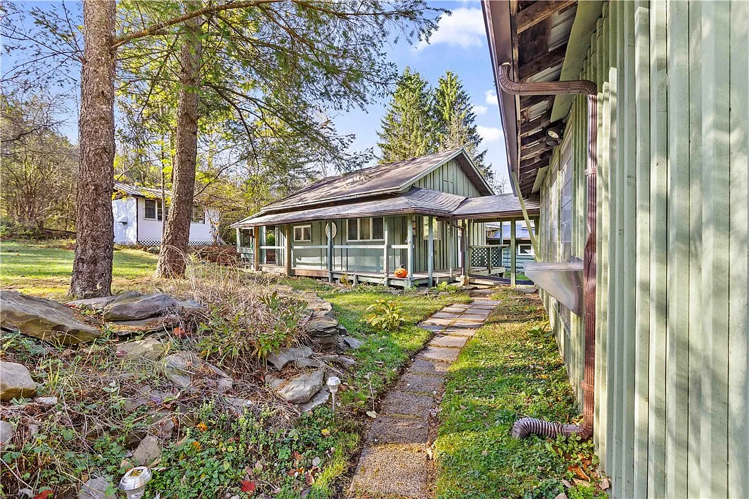 Log Cabin with Pond on 4.24 Private Acres in the Finger Lakes