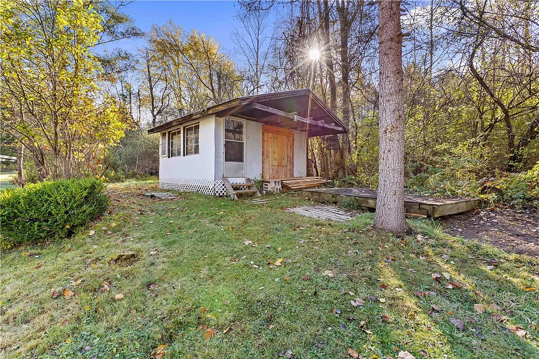 Log Cabin with Pond on 4.24 Private Acres in the Finger Lakes