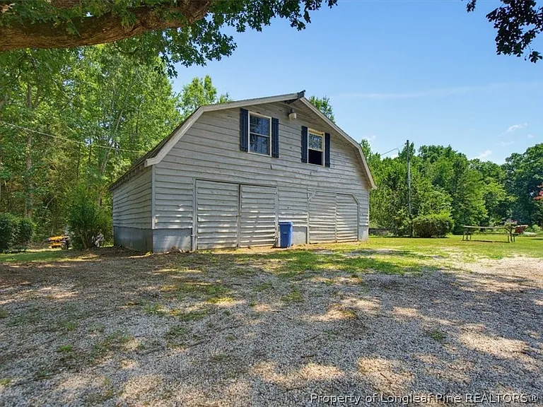 A Farmhouse With Its Own Barn on 9 Wooded Acres