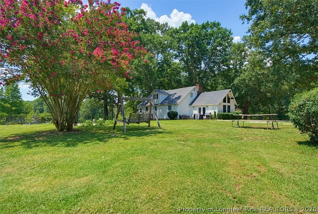 A Farmhouse With Its Own Barn on 9 Wooded Acres