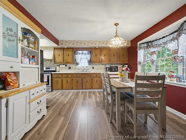 A Farmhouse With Its Own Barn on 9 Wooded Acres
