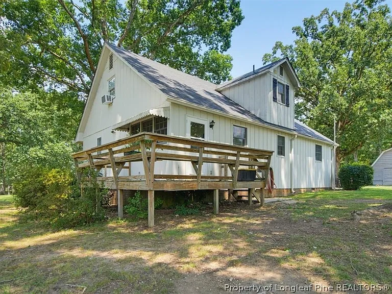 A Farmhouse With Its Own Barn on 9 Wooded Acres
