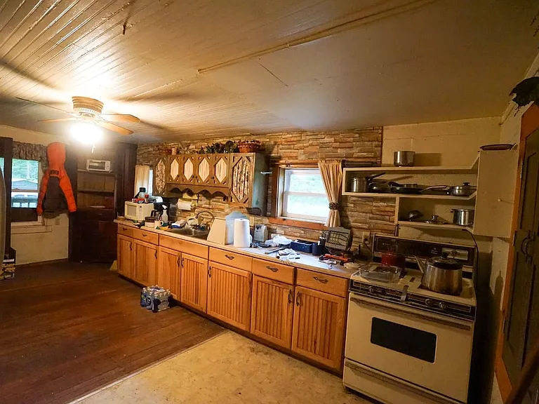 Farmhouse and Cabin on 57 Acres with a Cave and Waterfall in Noble County