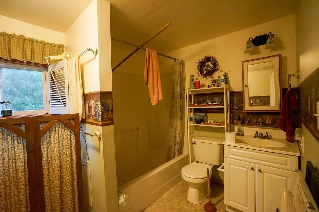 Farmhouse and Cabin on 57 Acres with a Cave and Waterfall in Noble County