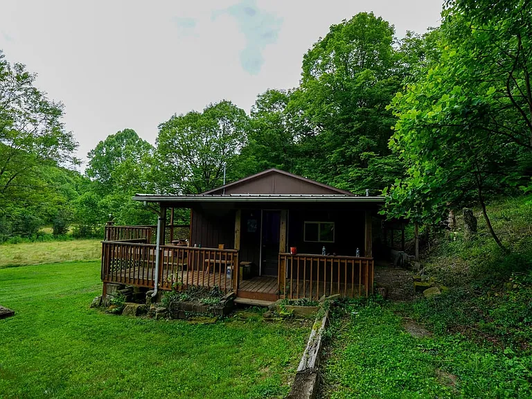 Farmhouse and Cabin on 57 Acres with a Cave and Waterfall in Noble County