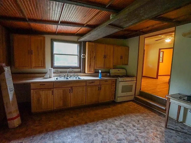 Farmhouse and Cabin on 57 Acres with a Cave and Waterfall in Noble County