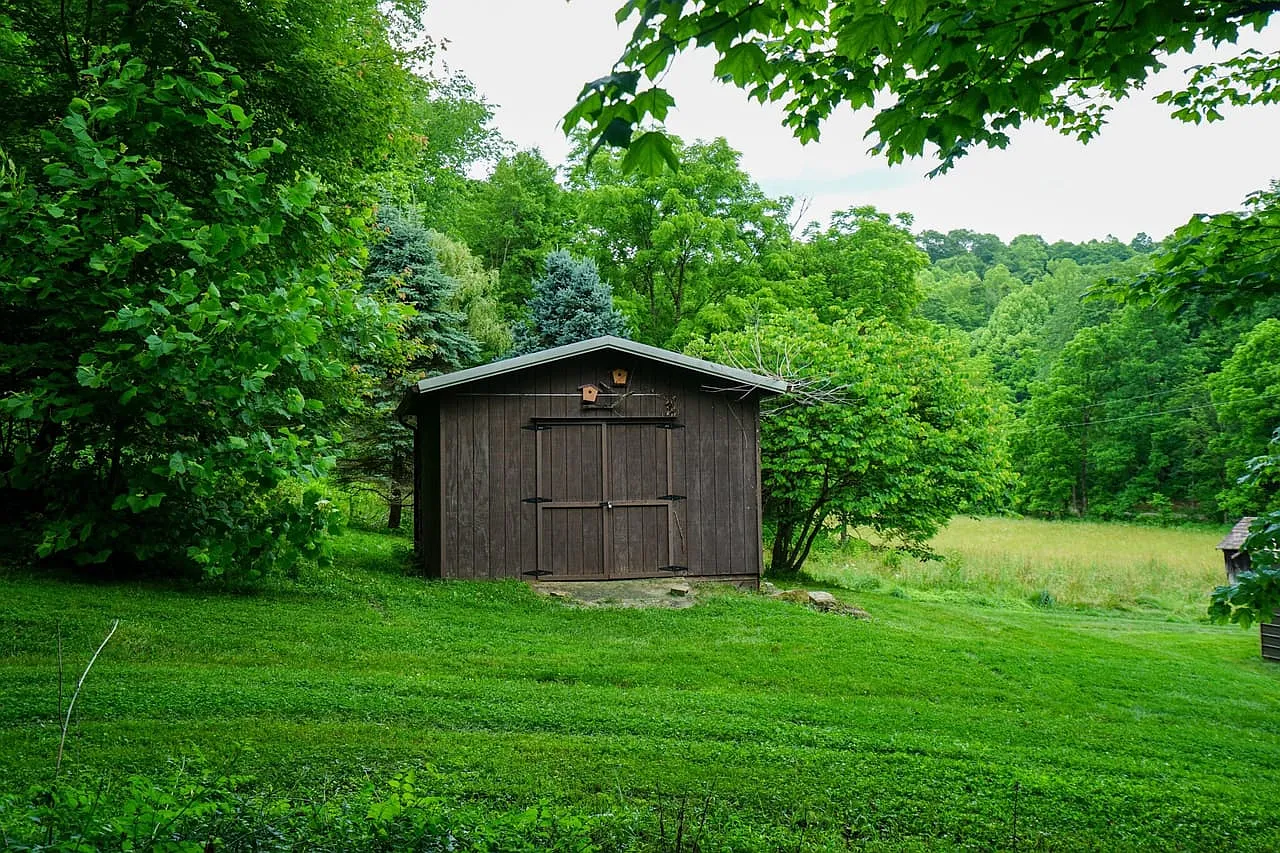 Farmhouse and Cabin on 57 Acres with a Cave and Waterfall in Noble County
