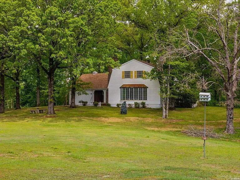 One-Owner Homestead with Private Pond on 11 Rolling Acres in the Ouachita Mountains