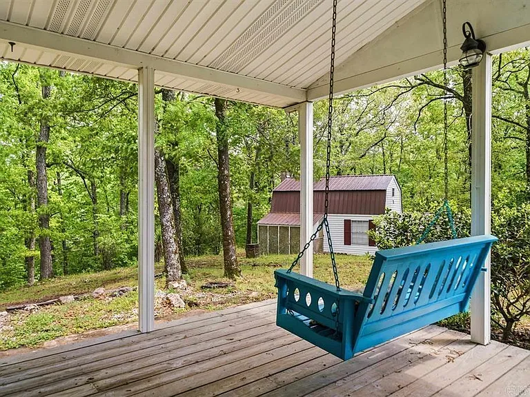 One-Owner Homestead with Private Pond on 11 Rolling Acres in the Ouachita Mountains