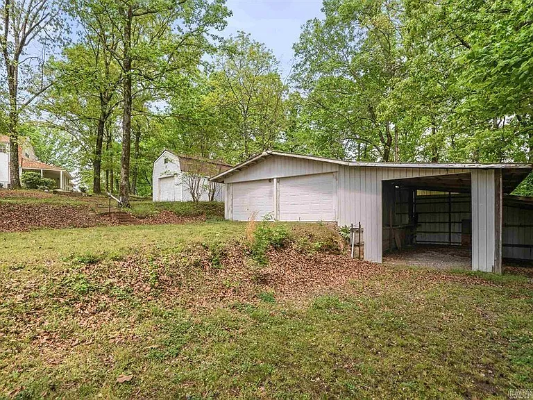 One-Owner Homestead with Private Pond on 11 Rolling Acres in the Ouachita Mountains