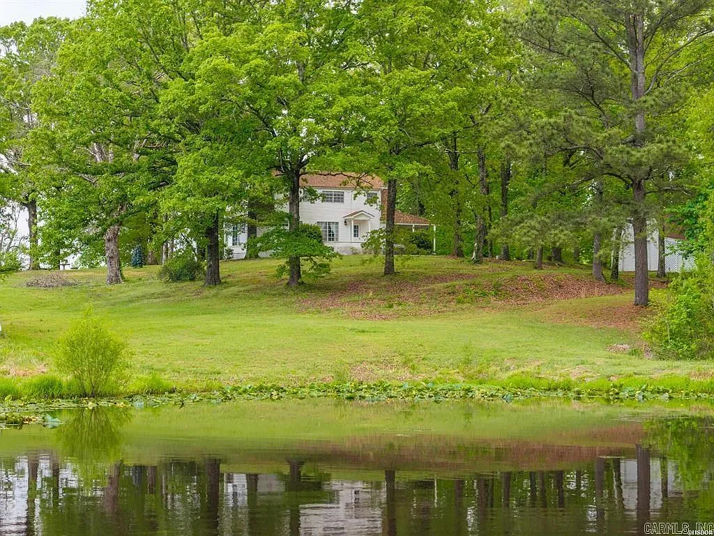 One-Owner Homestead with Private Pond on 11 Rolling Acres in the Ouachita Mountains