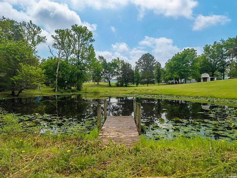 One-Owner Homestead with Private Pond on 11 Rolling Acres in the Ouachita Mountains