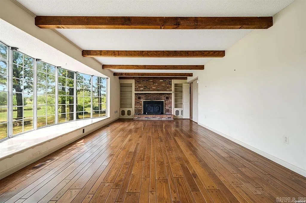 One-Owner Homestead with Private Pond on 11 Rolling Acres in the Ouachita Mountains