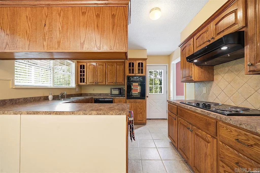 One-Owner Homestead with Private Pond on 11 Rolling Acres in the Ouachita Mountains
