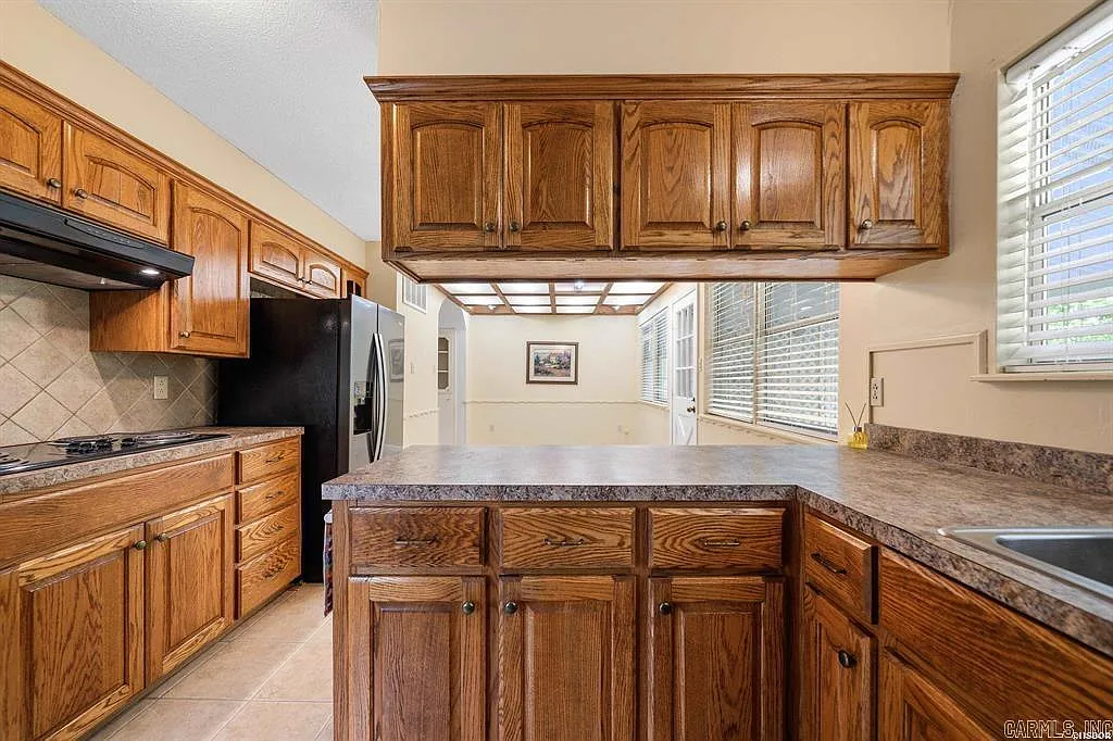 One-Owner Homestead with Private Pond on 11 Rolling Acres in the Ouachita Mountains