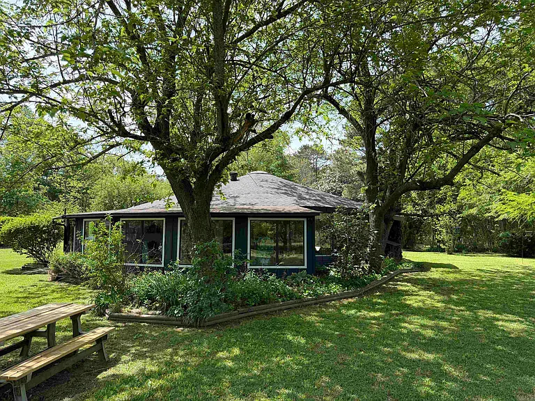 Ouachita River Homestead: 1,000 Feet of Private Frontage, 26 Acres of Pasture, and a Shop East of Mena