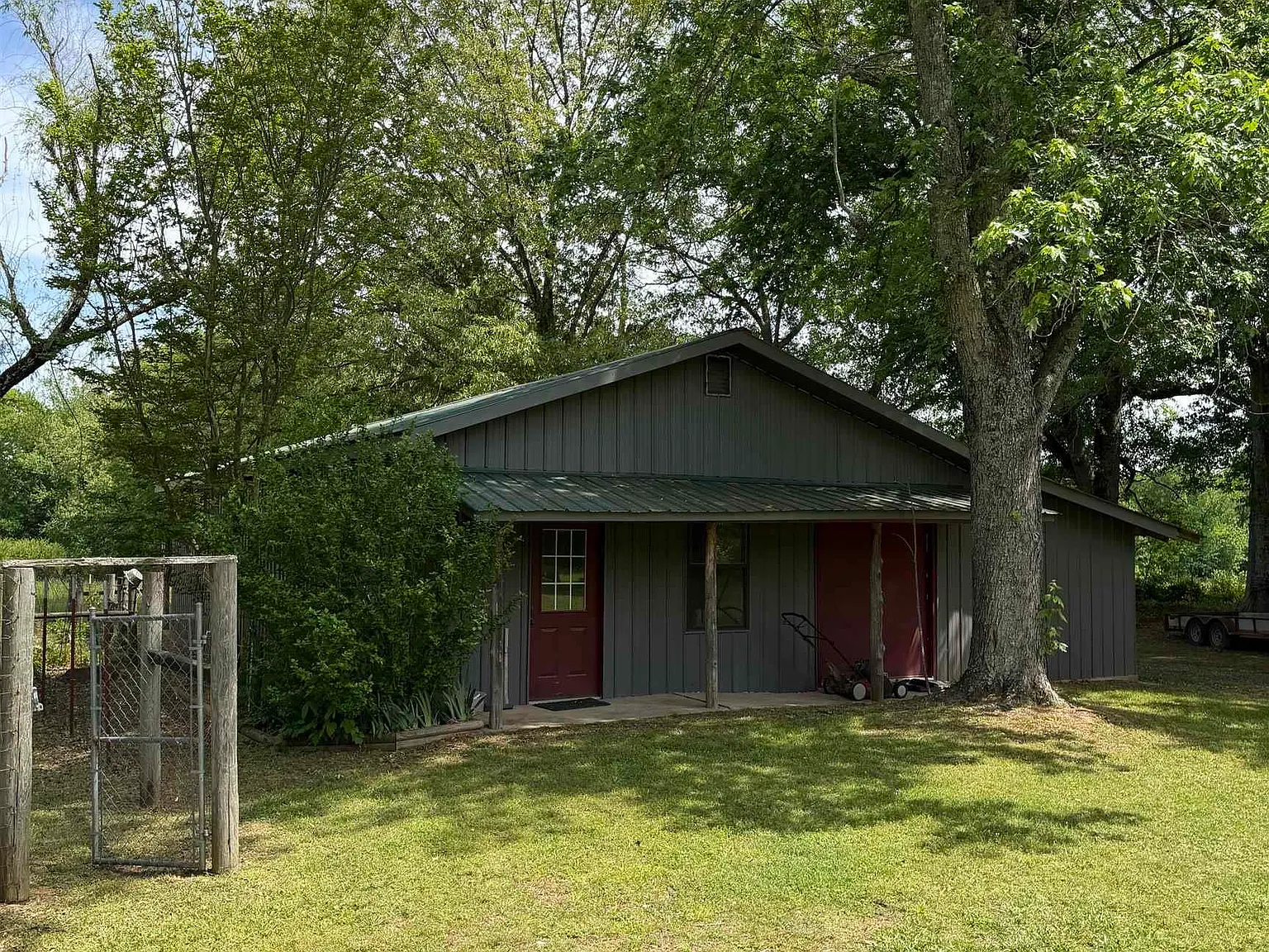 Ouachita River Homestead: 1,000 Feet of Private Frontage, 26 Acres of Pasture, and a Shop East of Mena