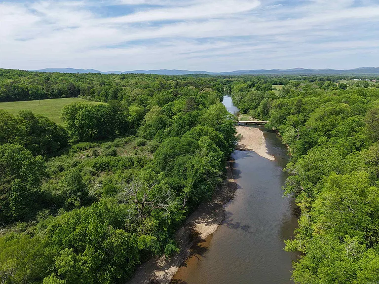 Ouachita River Homestead: 1,000 Feet of Private Frontage, 26 Acres of Pasture, and a Shop East of Mena