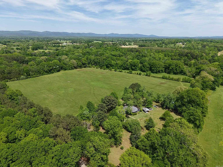 Ouachita River Homestead: 1,000 Feet of Private Frontage, 26 Acres of Pasture, and a Shop East of Mena