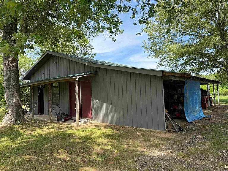 Ouachita River Homestead: 1,000 Feet of Private Frontage, 26 Acres of Pasture, and a Shop East of Mena
