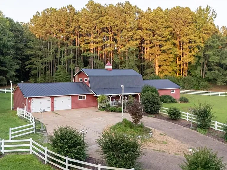 Custom Estate with Pond, Bridge Entrance, and Wooded Trails on 12 Acres Near I-95