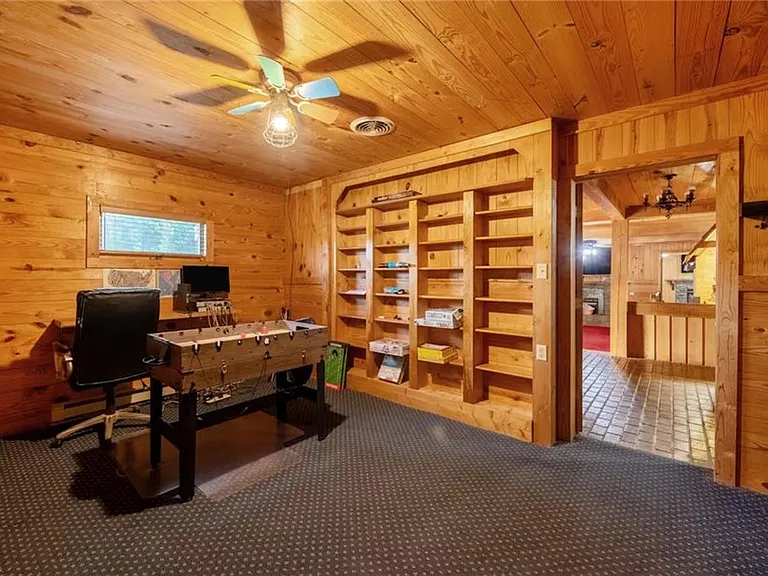 Custom Estate with Pond, Bridge Entrance, and Wooded Trails on 12 Acres Near I-95