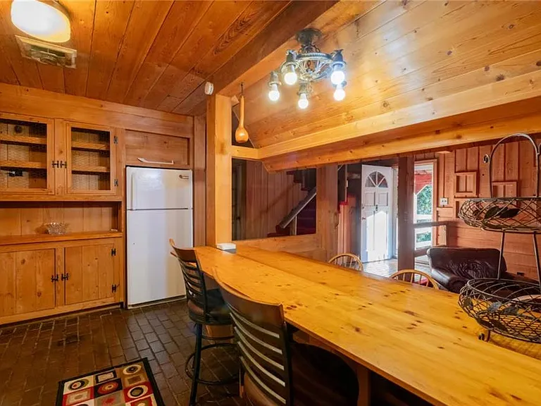 Custom Estate with Pond, Bridge Entrance, and Wooded Trails on 12 Acres Near I-95