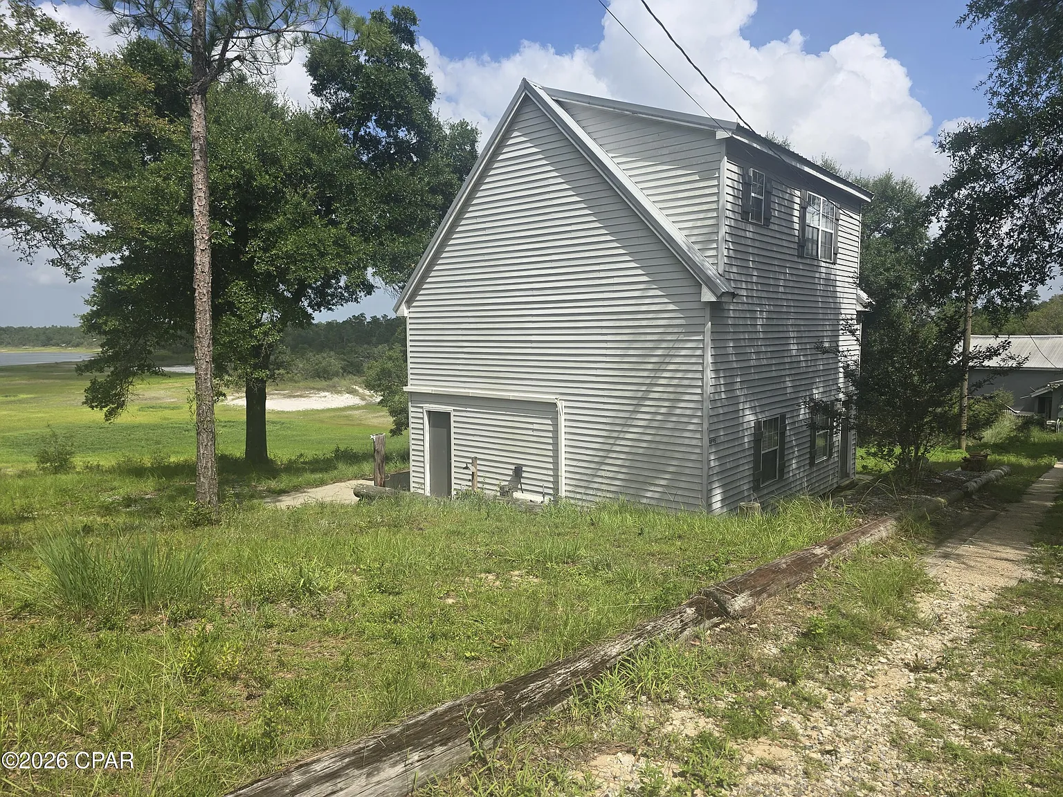A Barn of Your Own on Nearly 2.4 Acres Above Porter Pond