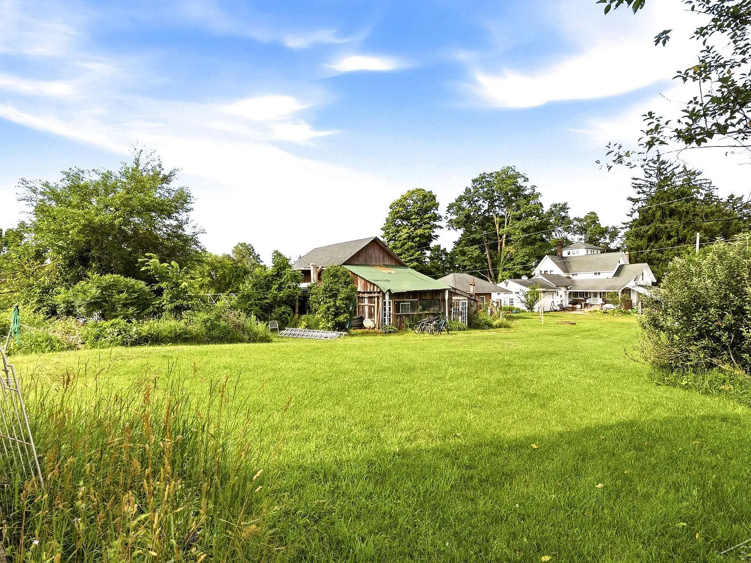 A Queen Anne Victorian with a Cupola, on Six Private Acres