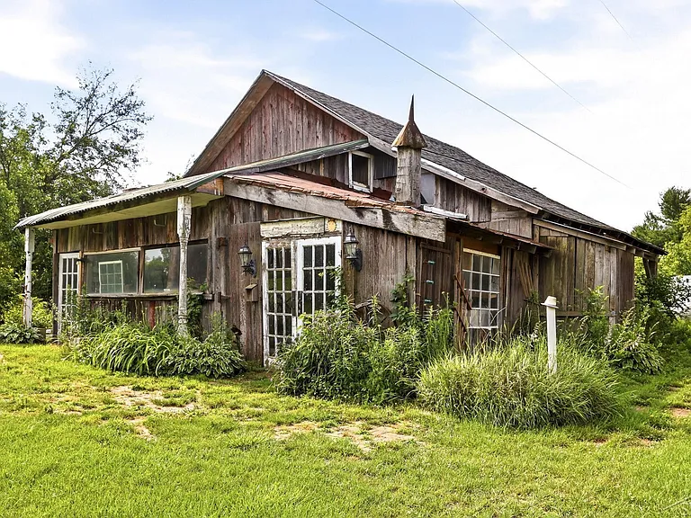 A Queen Anne Victorian with a Cupola, on Six Private Acres