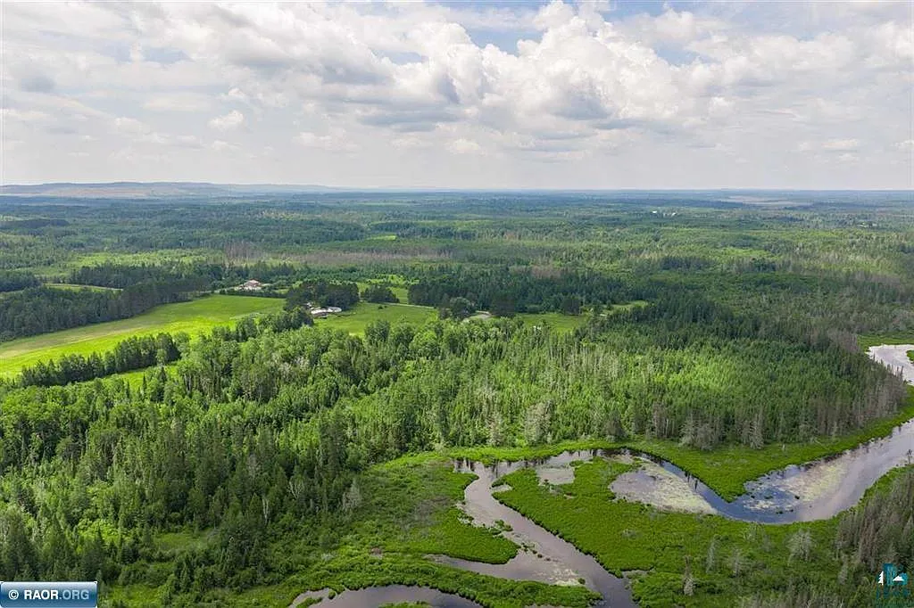 40 Acres with a Winding River Running Through It