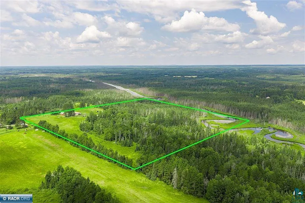 40 Acres with a Winding River Running Through It