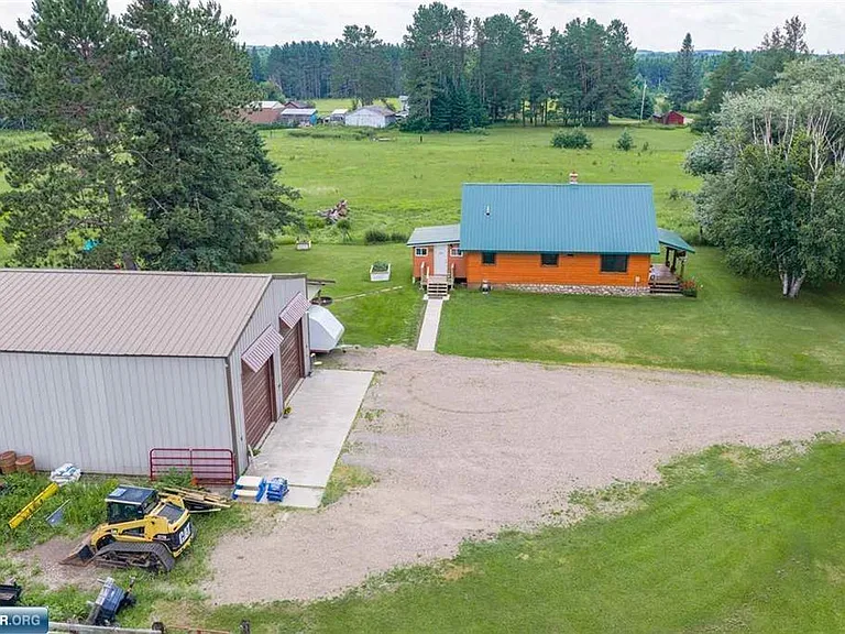 40 Acres with a Winding River Running Through It