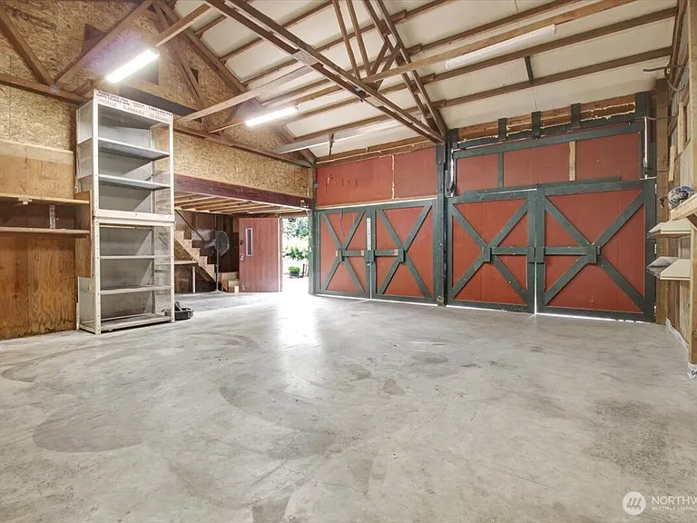 1929 Country Homestead with Deeded River Frontage and a Full Outbuilding Package on 11 Cascade Foothills Acres