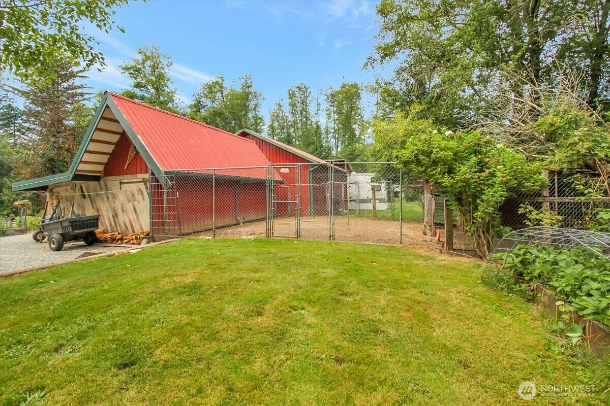 1929 Country Homestead with Deeded River Frontage and a Full Outbuilding Package on 11 Cascade Foothills Acres