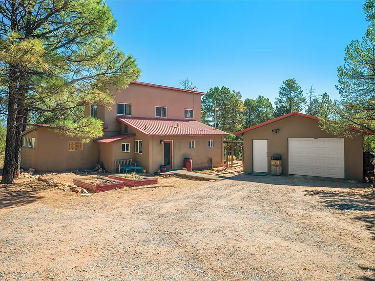 A Pine-Shaded Home With Rowe Mesa Views on 5 Private Acres