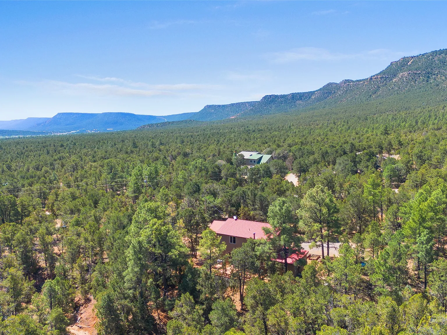 A Pine-Shaded Home With Rowe Mesa Views on 5 Private Acres
