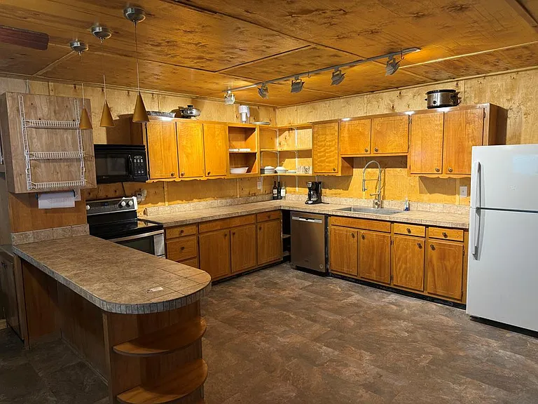 6.92 Acres, Updated Mechanicals, and Two Unfinished Outbuildings in the Nantahala Foothills