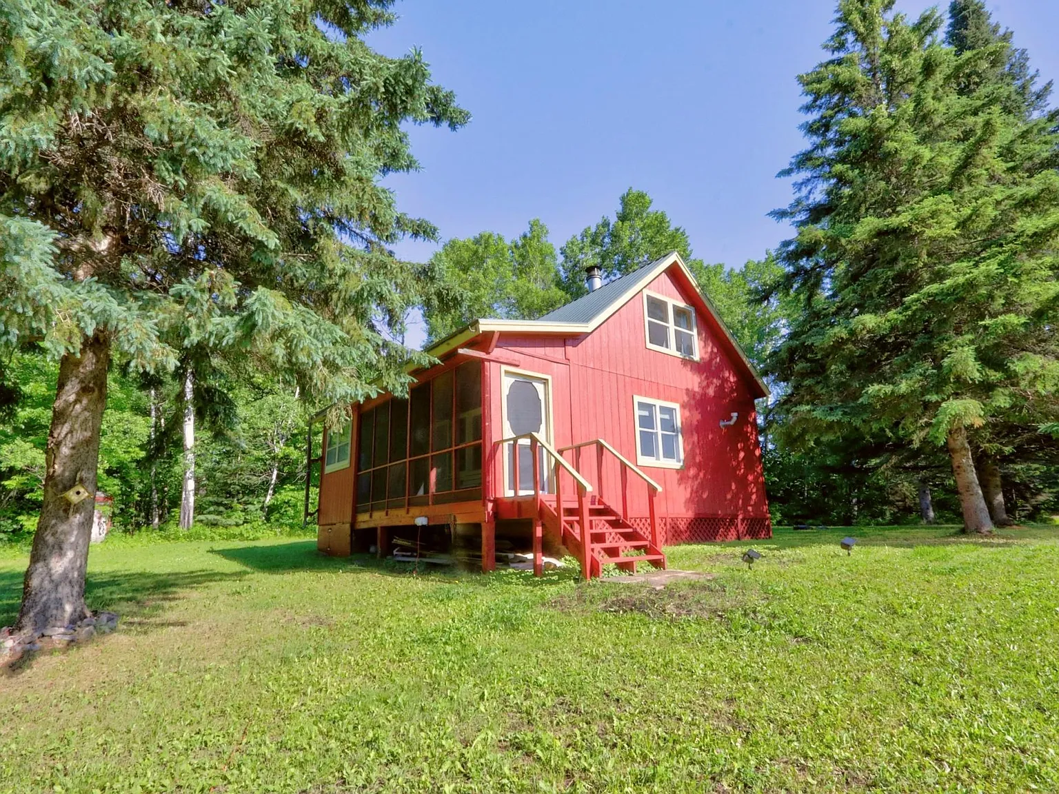 41 Acres on the Sturgeon River, With a Fully Furnished 1900 Cabin