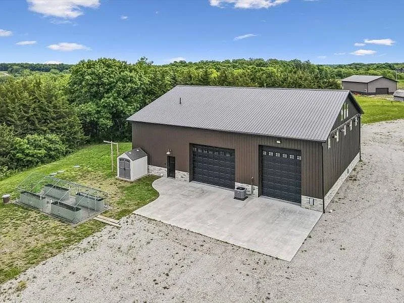 A Barndominium Lodge on Nearly 14 Acres by Sundown Lake