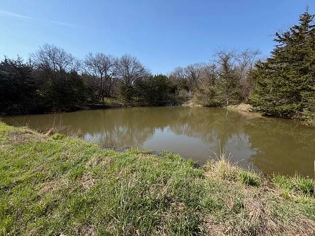 A Barndominium Lodge on Nearly 14 Acres by Sundown Lake
