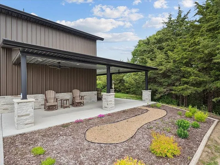 A Barndominium Lodge on Nearly 14 Acres by Sundown Lake