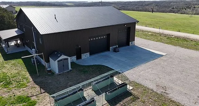 A Barndominium Lodge on Nearly 14 Acres by Sundown Lake