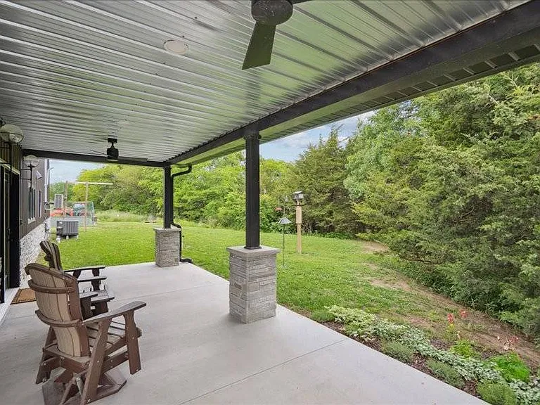A Barndominium Lodge on Nearly 14 Acres by Sundown Lake