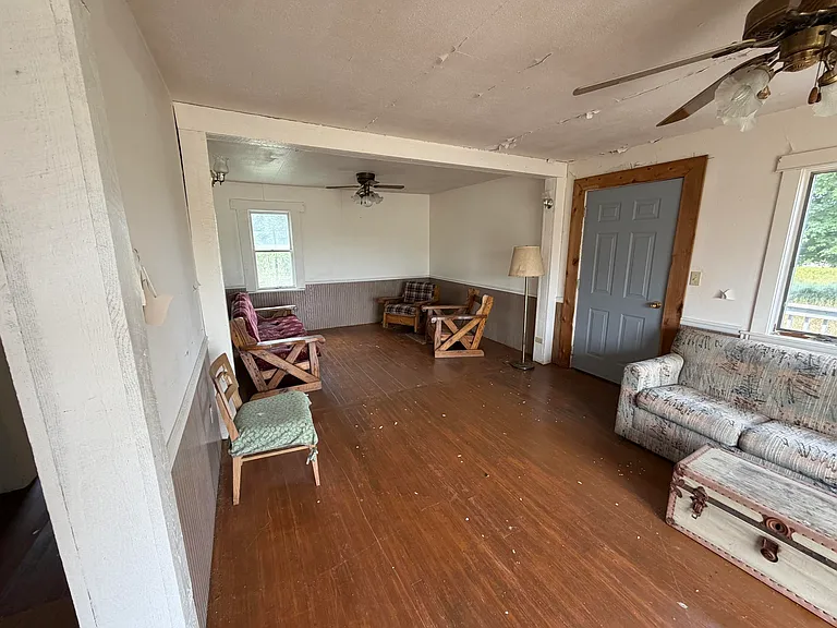 A Fixer-Upper Farmhouse on 10 Wide-Open Acres