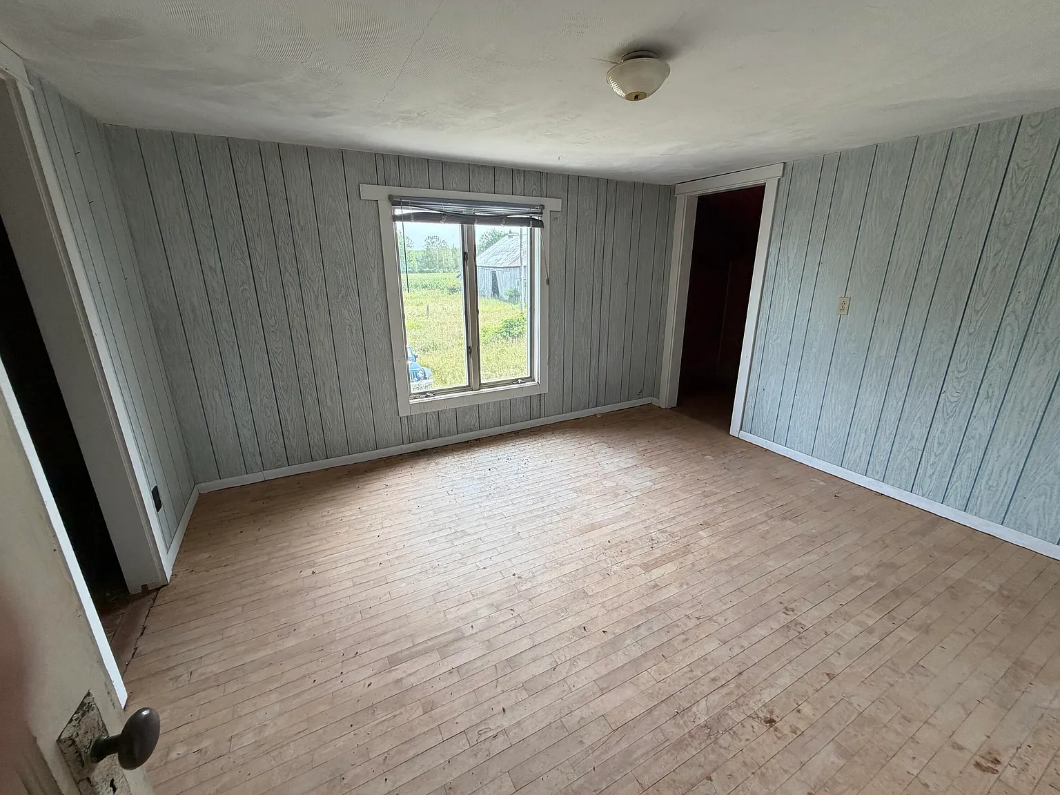 A Fixer-Upper Farmhouse on 10 Wide-Open Acres