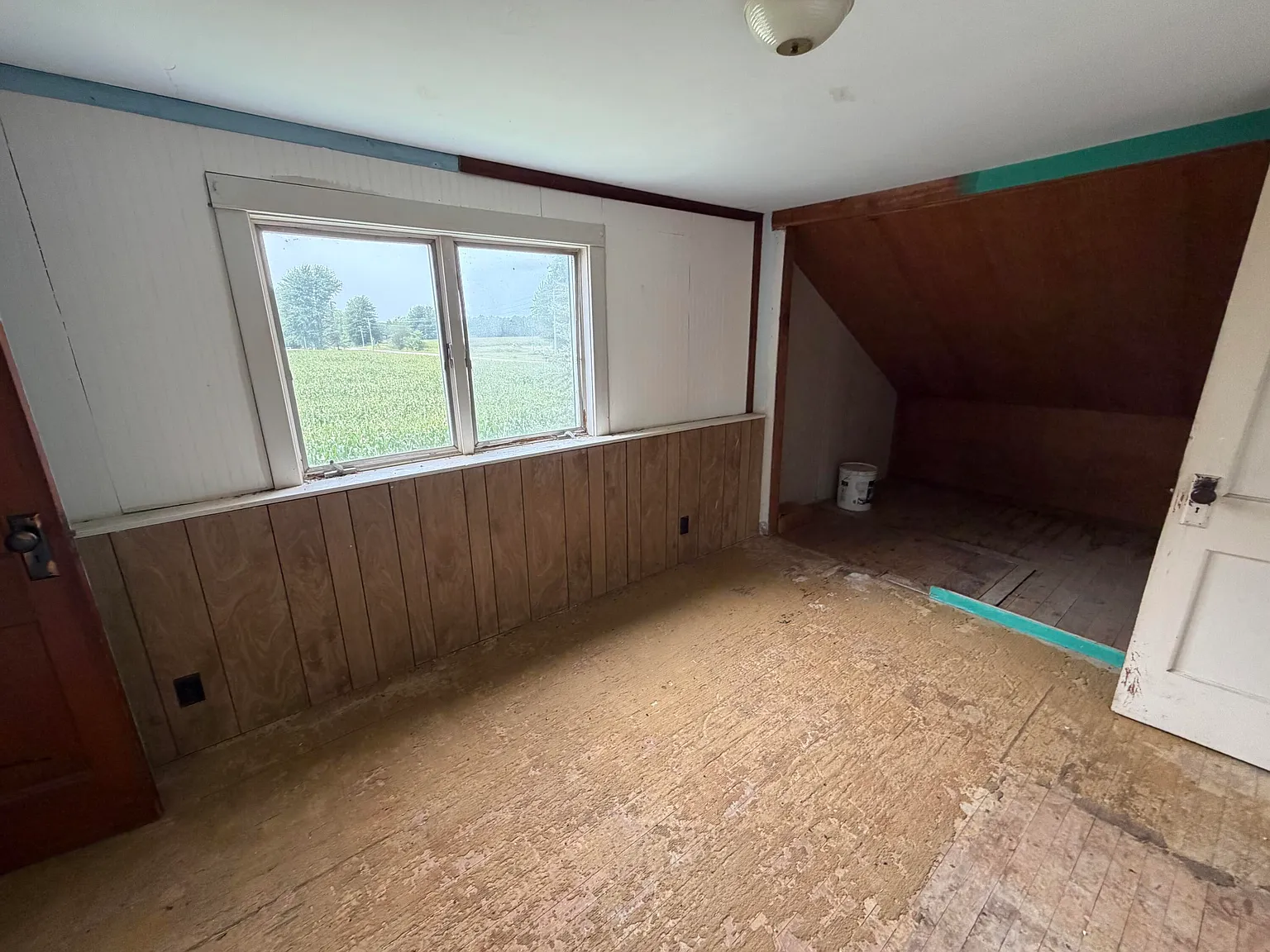 A Fixer-Upper Farmhouse on 10 Wide-Open Acres